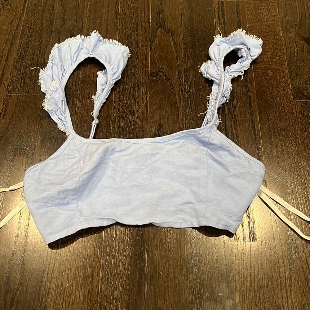 Very cropped top with ruffled straps